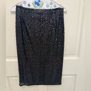 Halogen black sequin below the knee skirt.